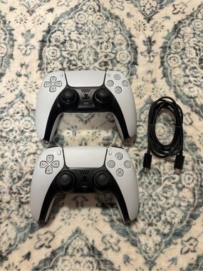 Sony DualSense Wireless Controllers in White and Black - Pair with Cable